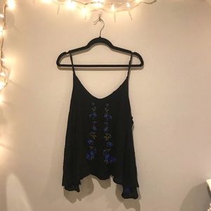 Flowy black top with blue floral